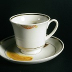 Traces.  1995.  Oil on ceramic teacup and saucer.